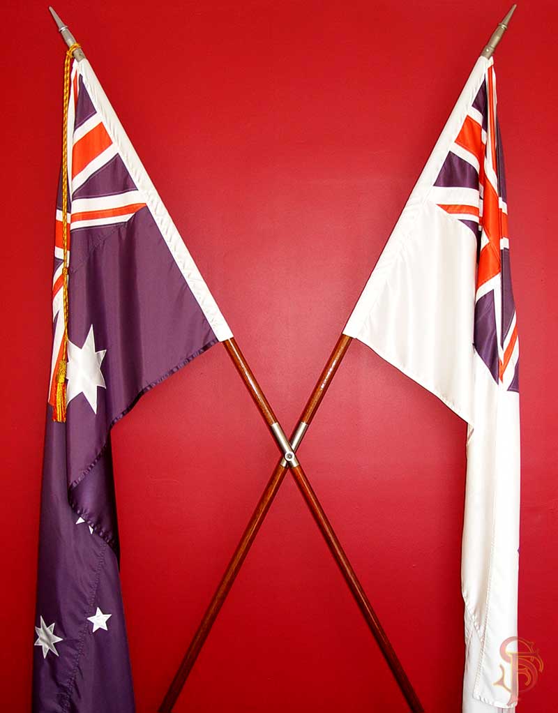 Crossed flagpoles, ceremonial timber parade pikes